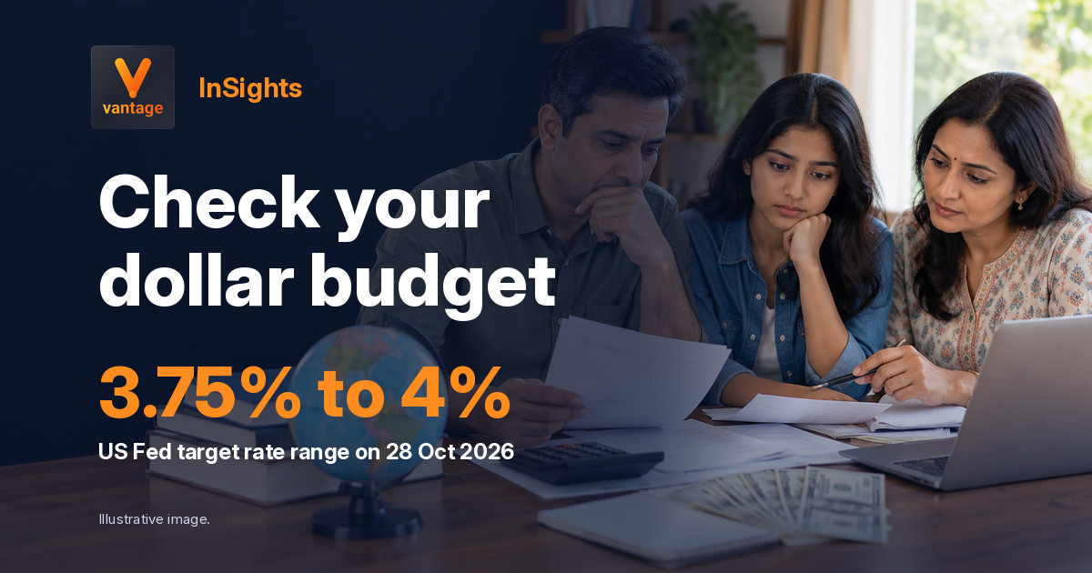 Indian family reviews paperwork and dollars while planning overseas expenses after the Fed rate hold