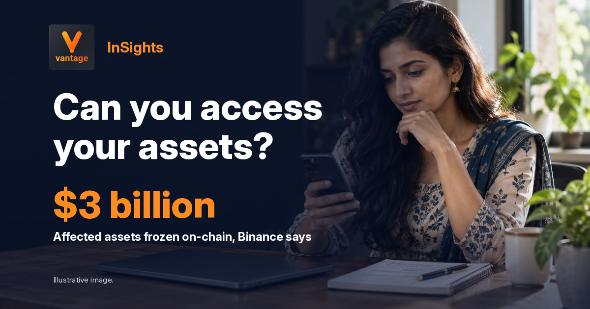 Woman checks a phone beside a laptop and notes after the Binance security incident